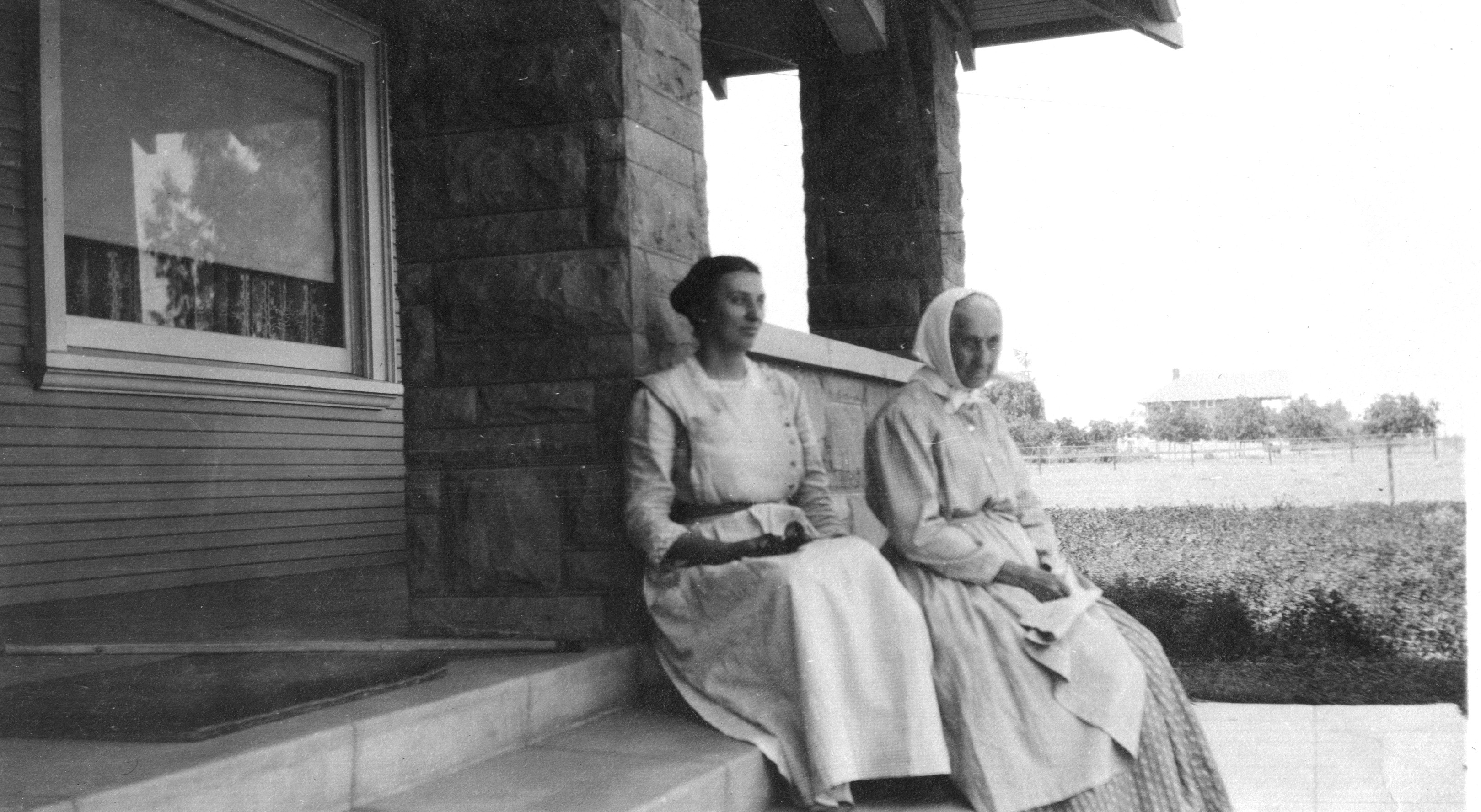 Anna (Thill) Wagner and her mother Margaret (Wagner) Hittenger on the front steps of her home on Manchester Blvd and Normandy Ave.  Looking west about two blocks was John Wagner and Anna (Wagner) Thill brother's home, Michael Wagner.  His house and barns were at the corner of Manchester Blvd. and Denker Ave.